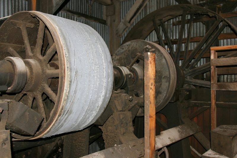 Wheels to drive the mill.